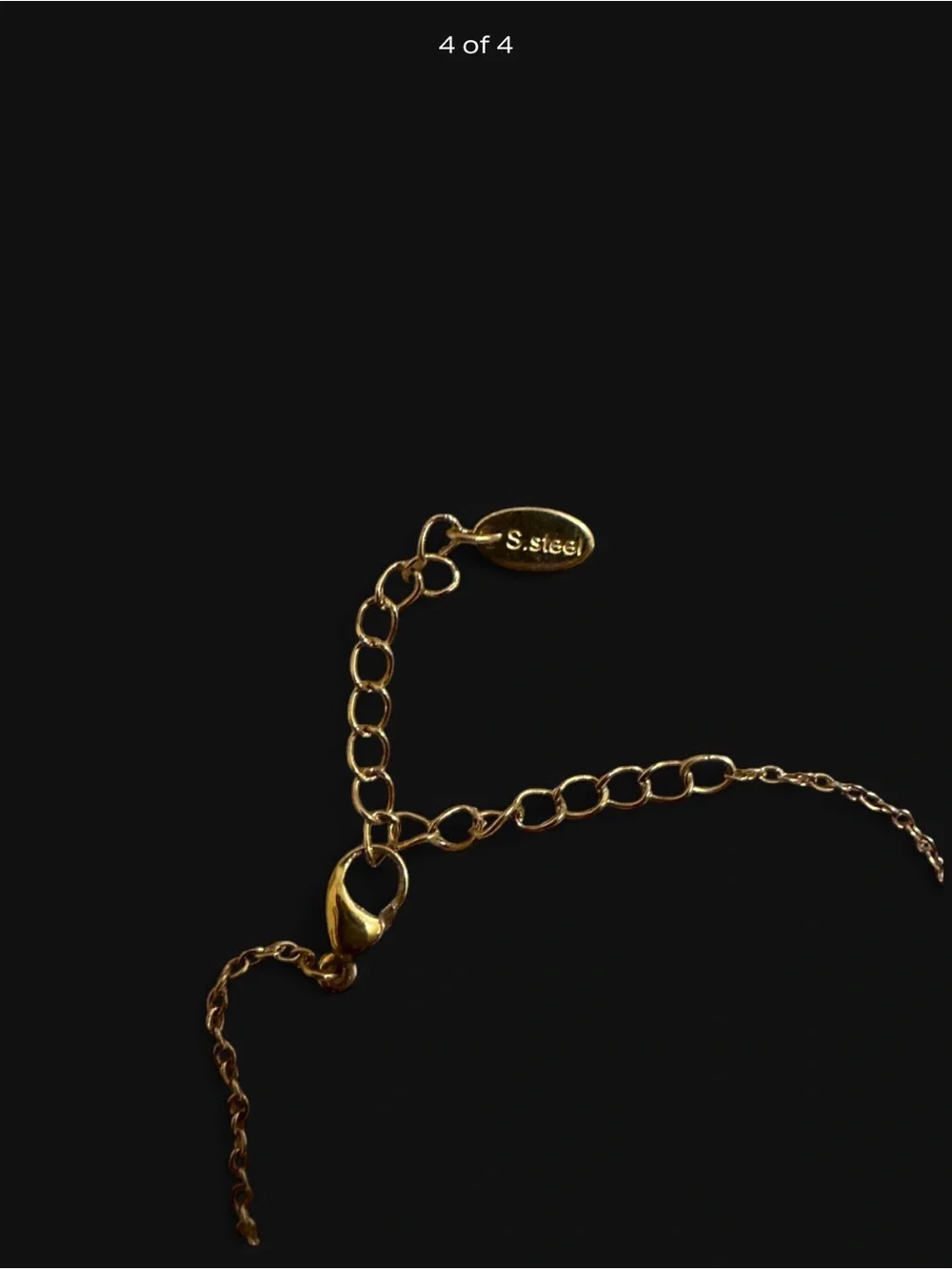 Stainless Steel Gold Infinity Bracelet With Rhinestones.
